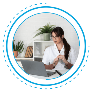 Doctor emailing patients